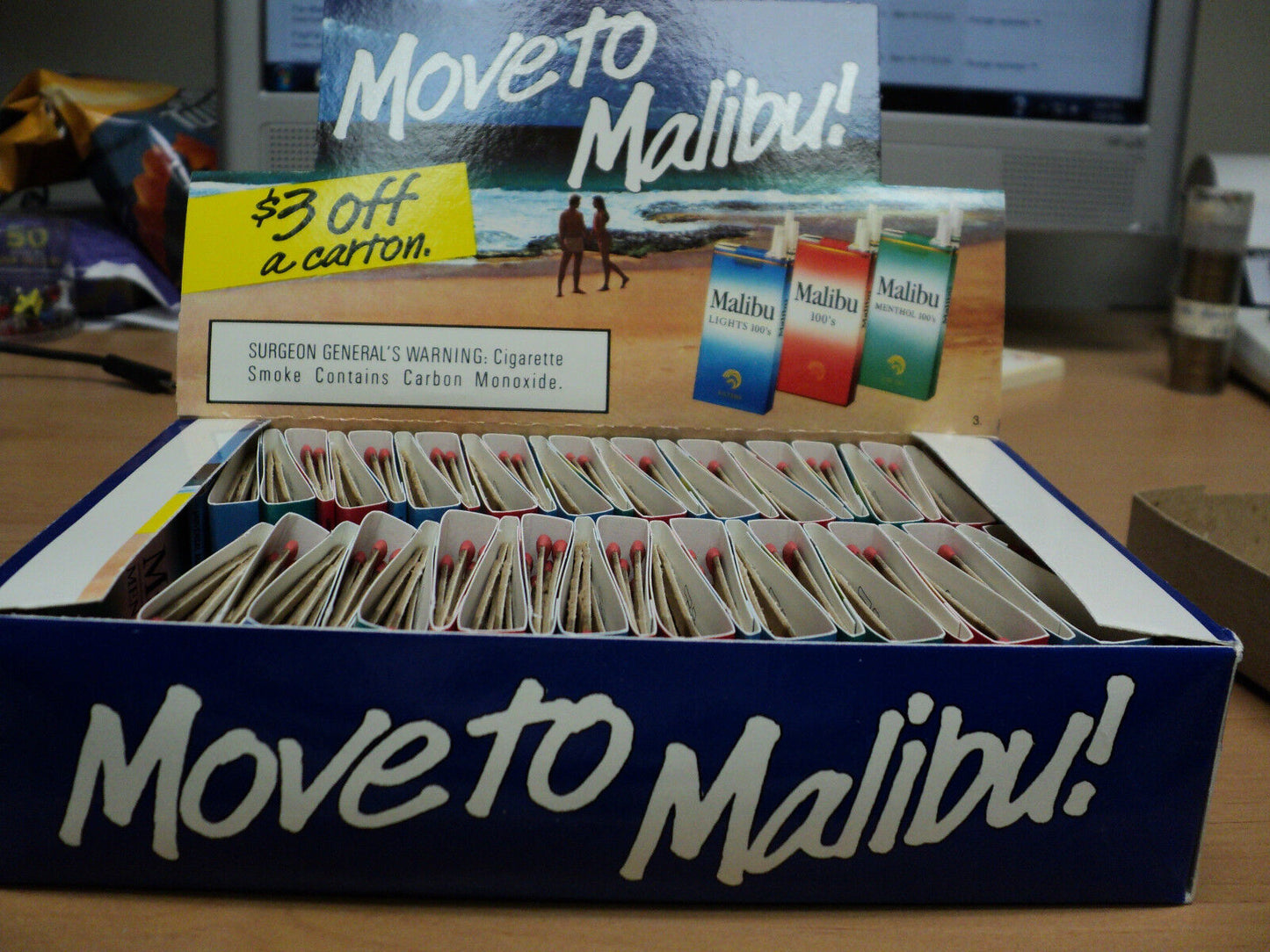 Box Counter Display With  47 Malibu Cigarette matchbooks.