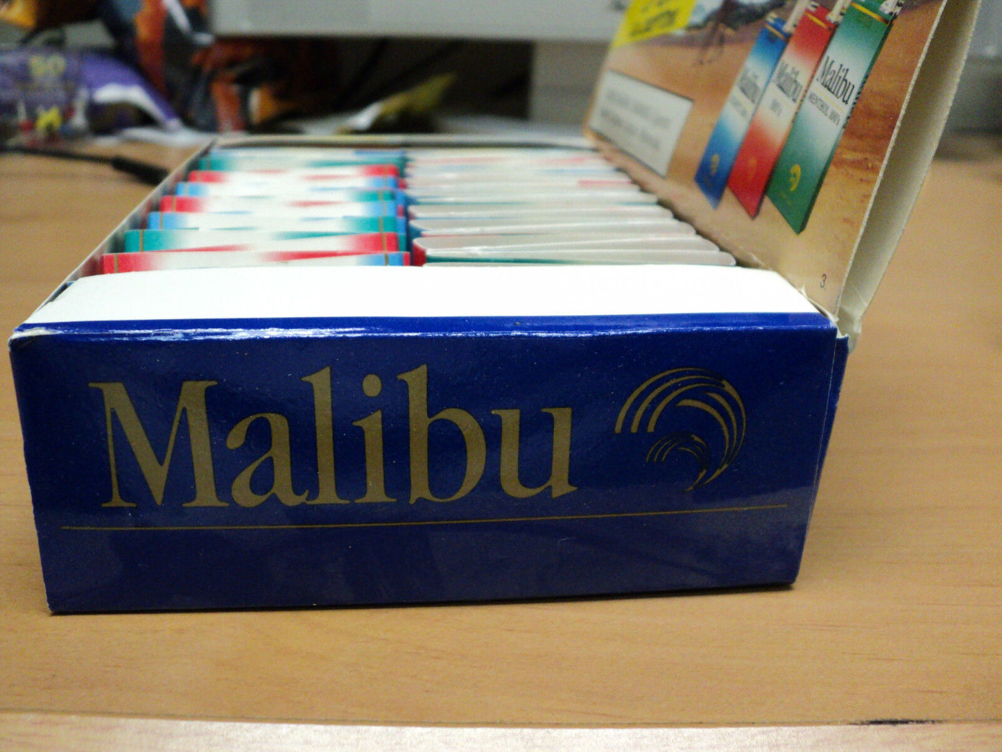 Box Counter Display With  47 Malibu Cigarette matchbooks.