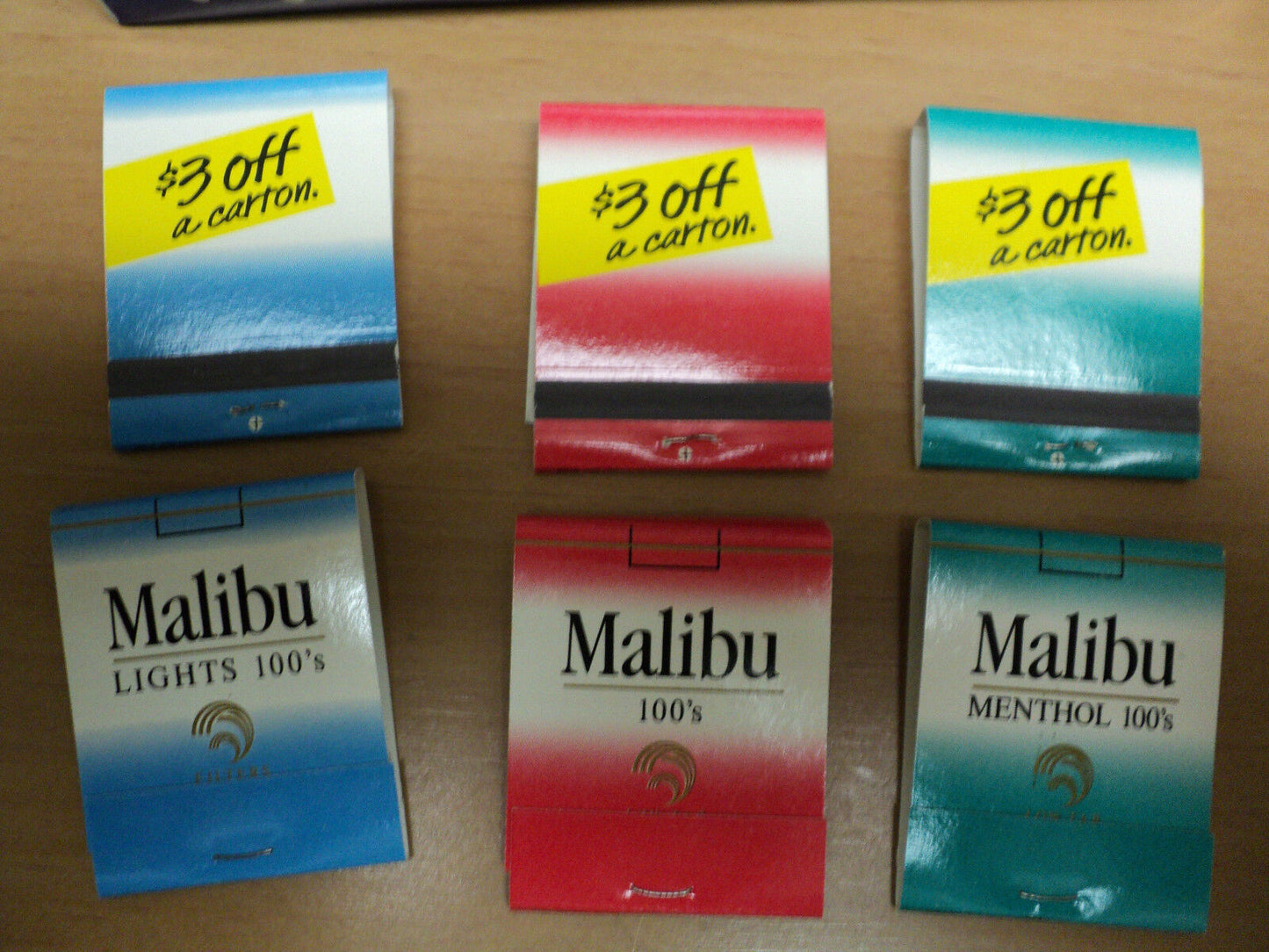 Box Counter Display With  47 Malibu Cigarette matchbooks.