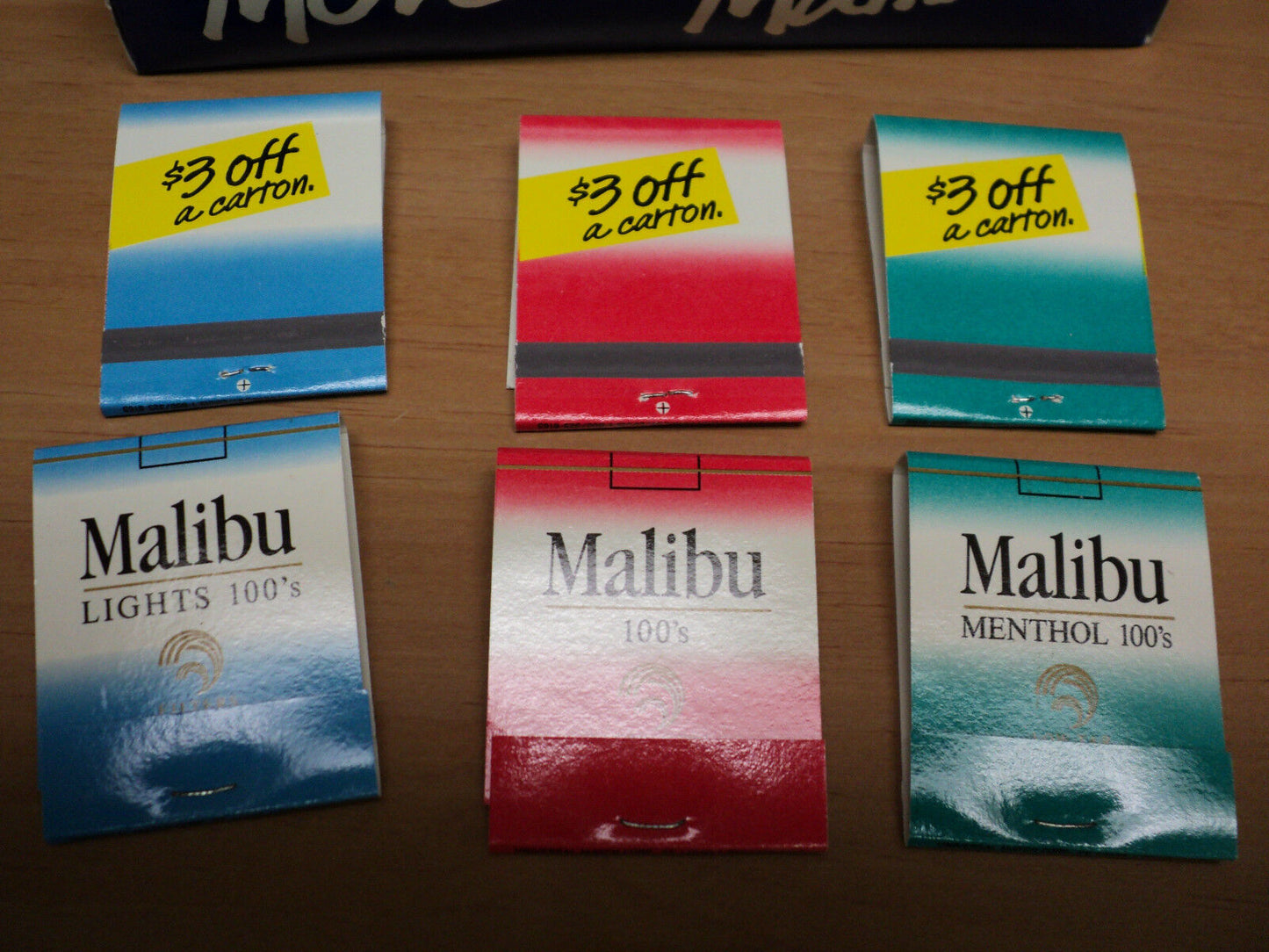 Box Counter Display With  47 Malibu Cigarette matchbooks.